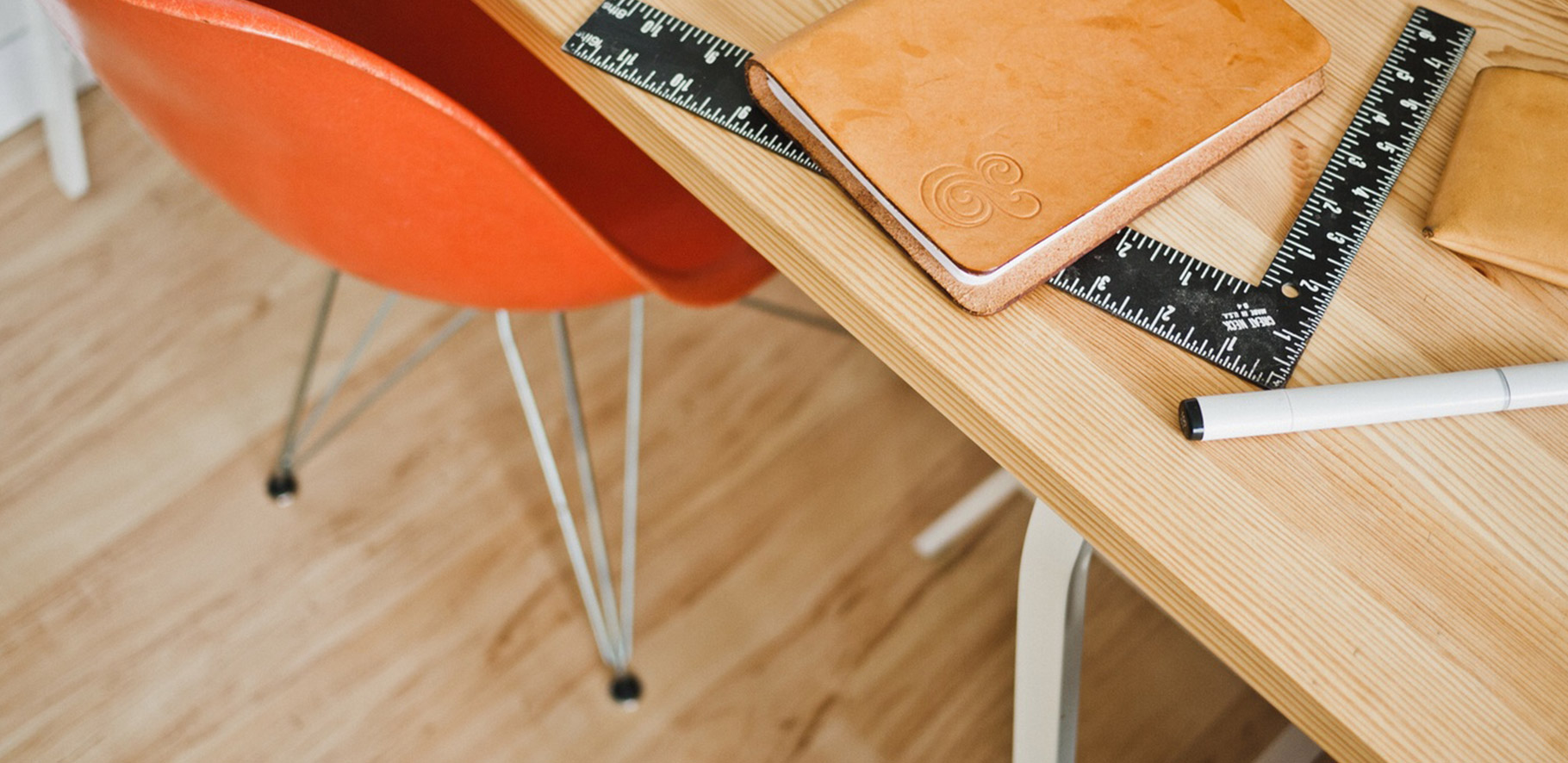 diary sitting on a table along with an empty chair